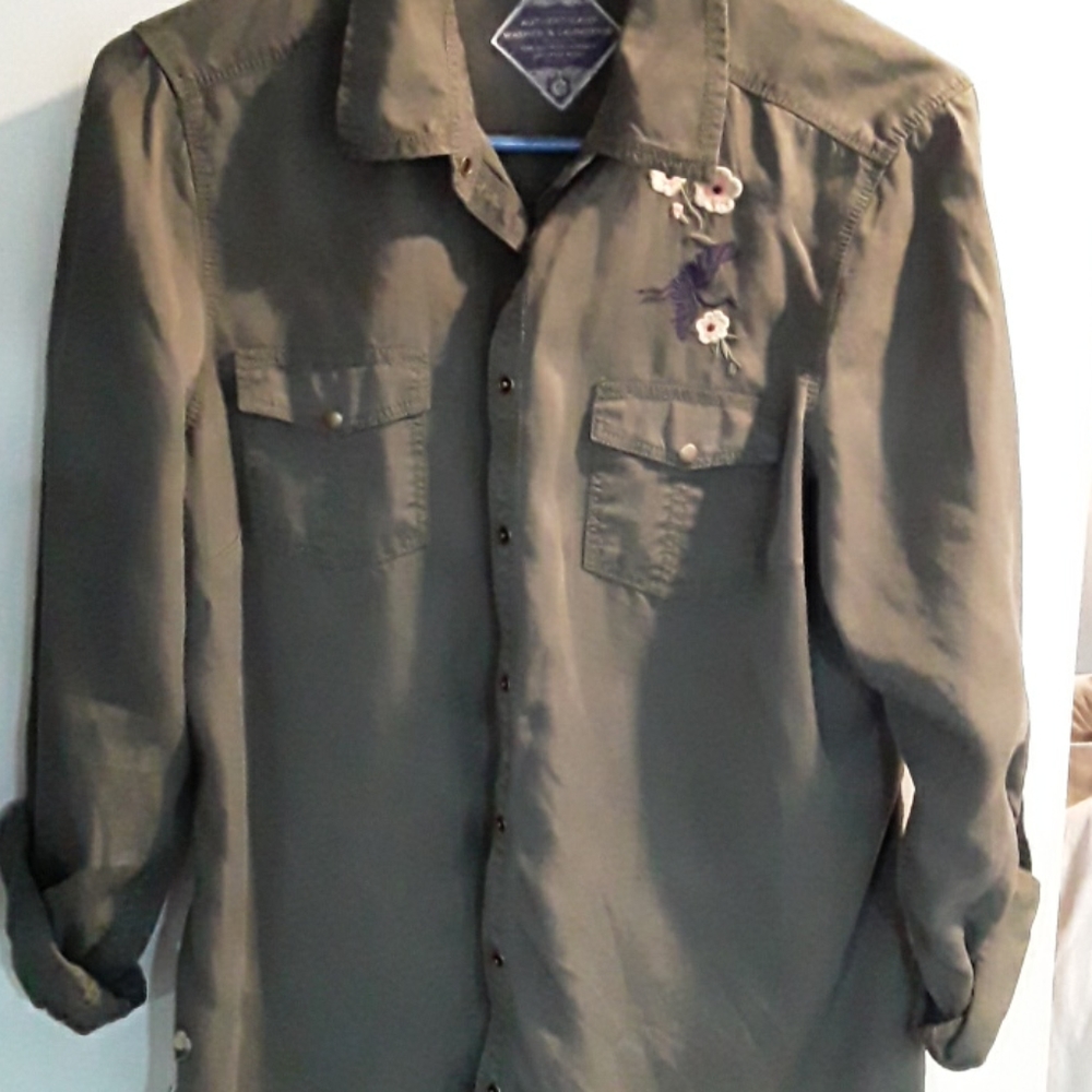Green button down shirt